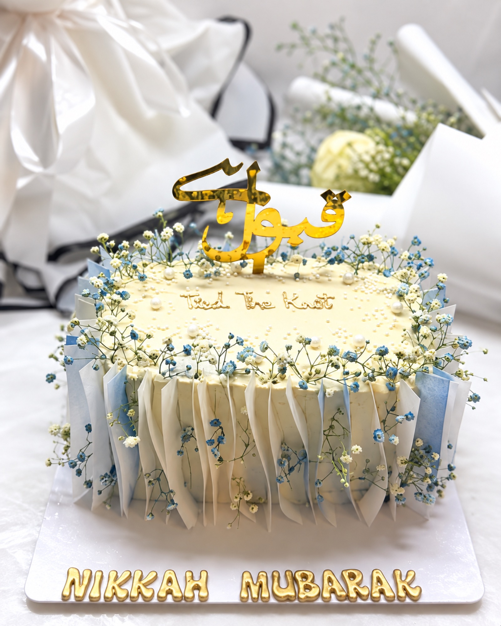 White and blue floral Nikkah cake